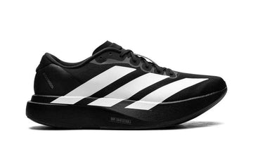 Black Adidas sneaker with white stripes on a white background
