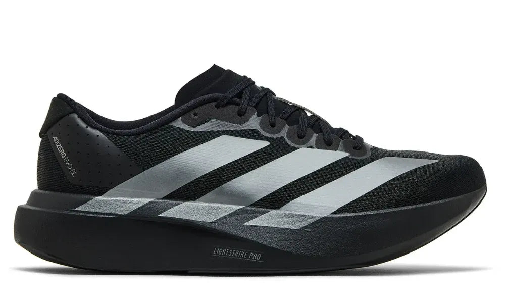 Black Adidas running shoe with white stripes on a white background
