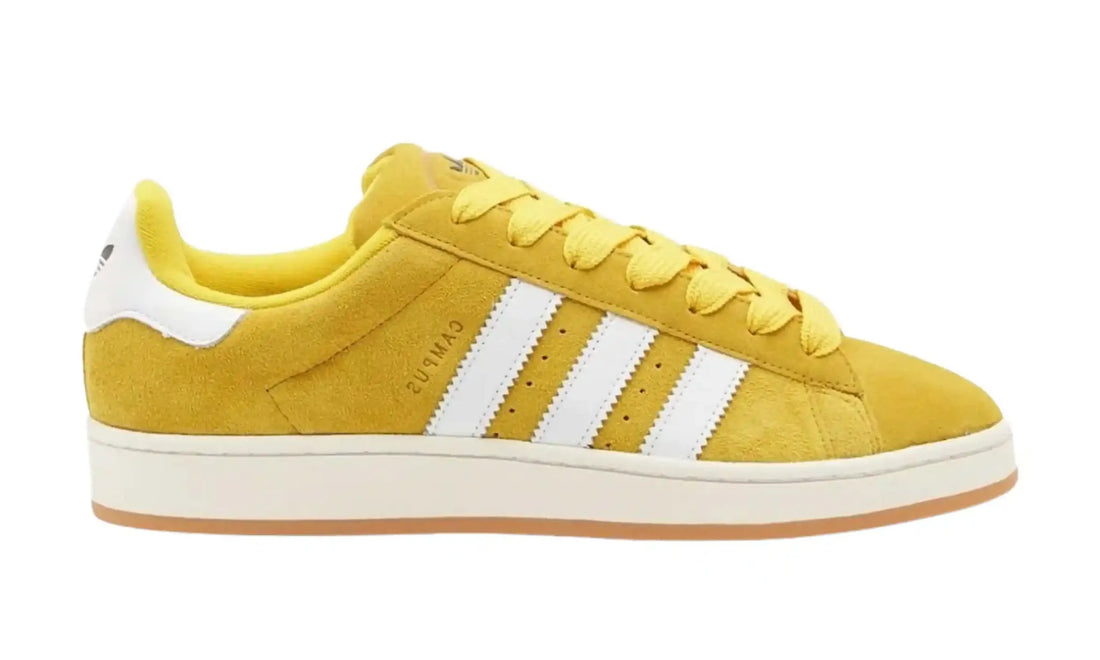 Adidas Campus 00s yellow white unisex sneakers with white stripes and gum sole, side view