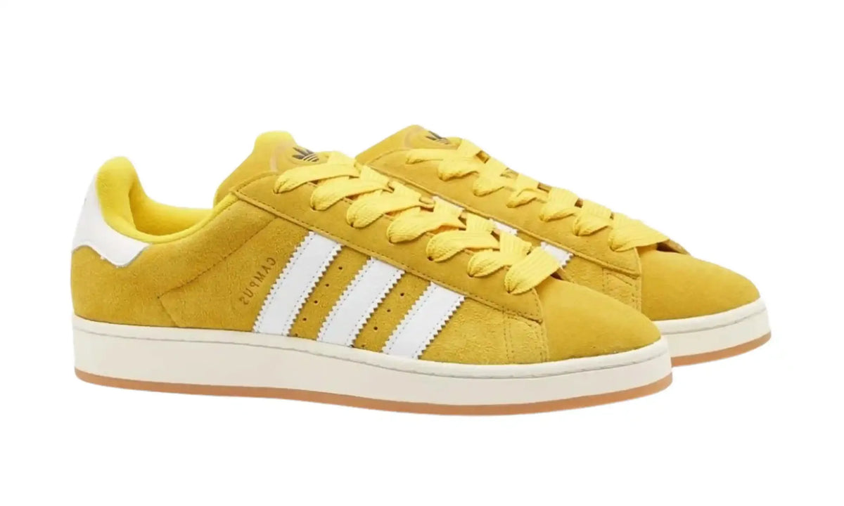 Adidas Campus 00s yellow white unisex sneakers with white stripes and gum sole, front angled pair view