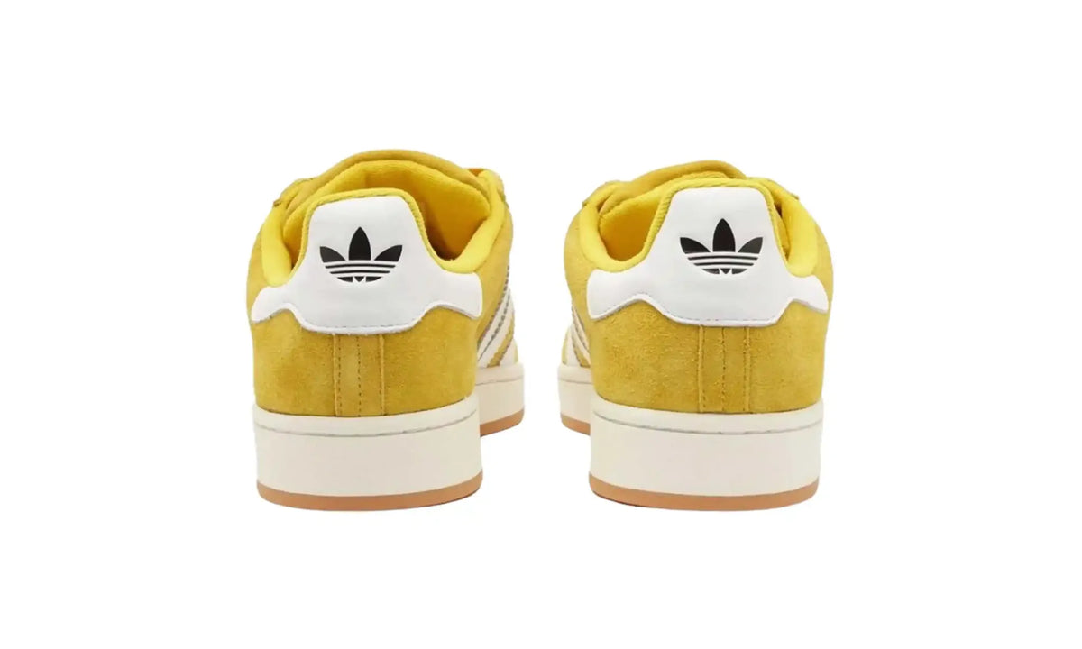 Adidas Campus 00s yellow white unisex sneakers with white stripes and gum sole, heel view