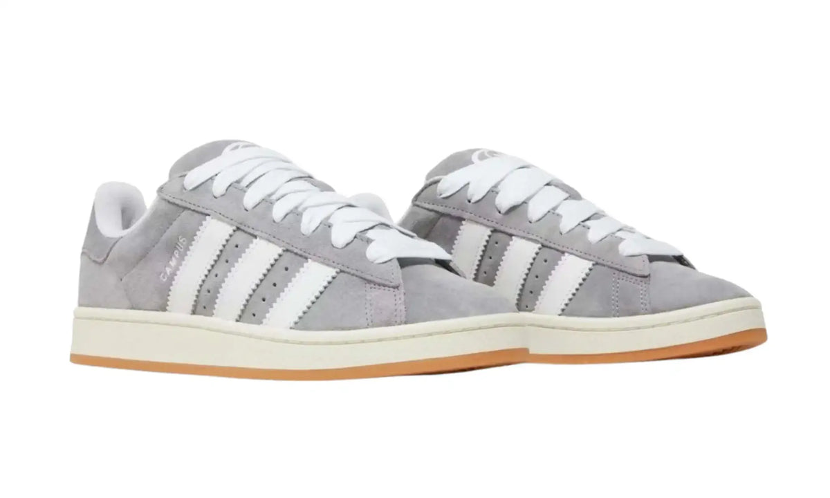 Adidas Campus grey white unisex sneakers with white stripes and gum sole, front angled pair view