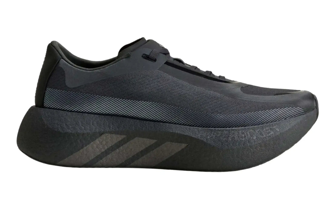 Side view of black Adidas HYPERBOOST EDGE running shoe with thick cushioned sole