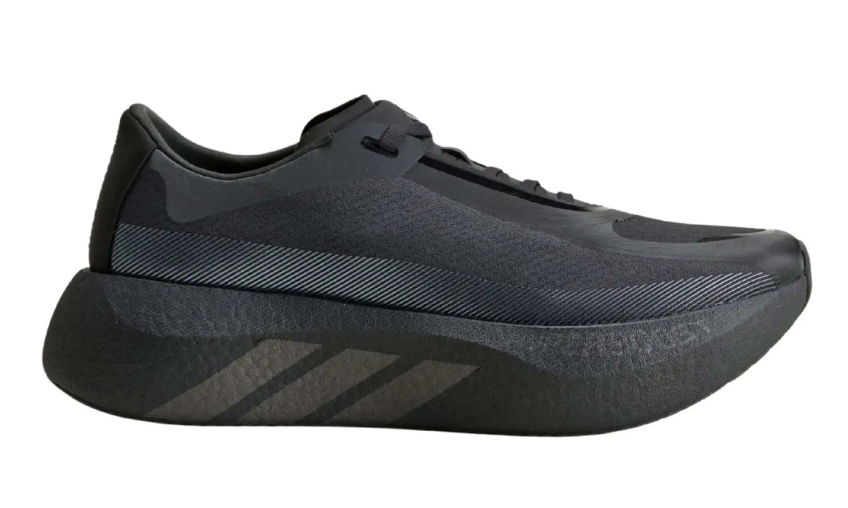 Side view of black Adidas HYPERBOOST EDGE running shoe with thick cushioned sole