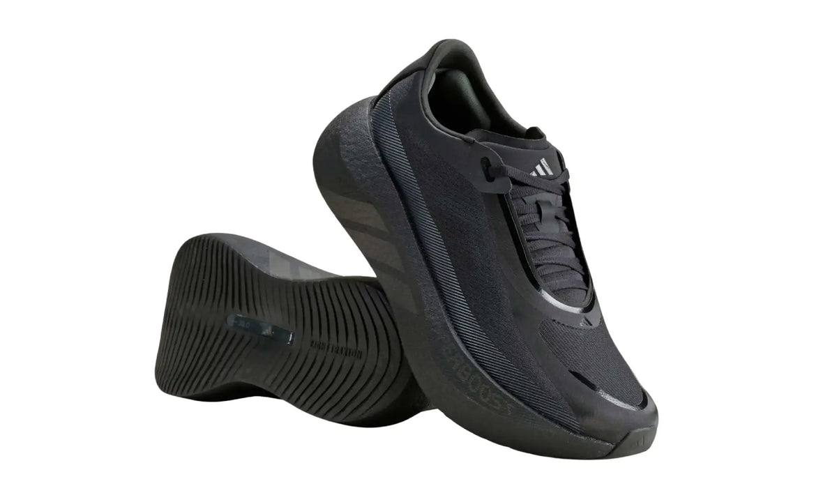 Angled view of black Adidas HYPERBOOST EDGE running shoes showing top and outsole