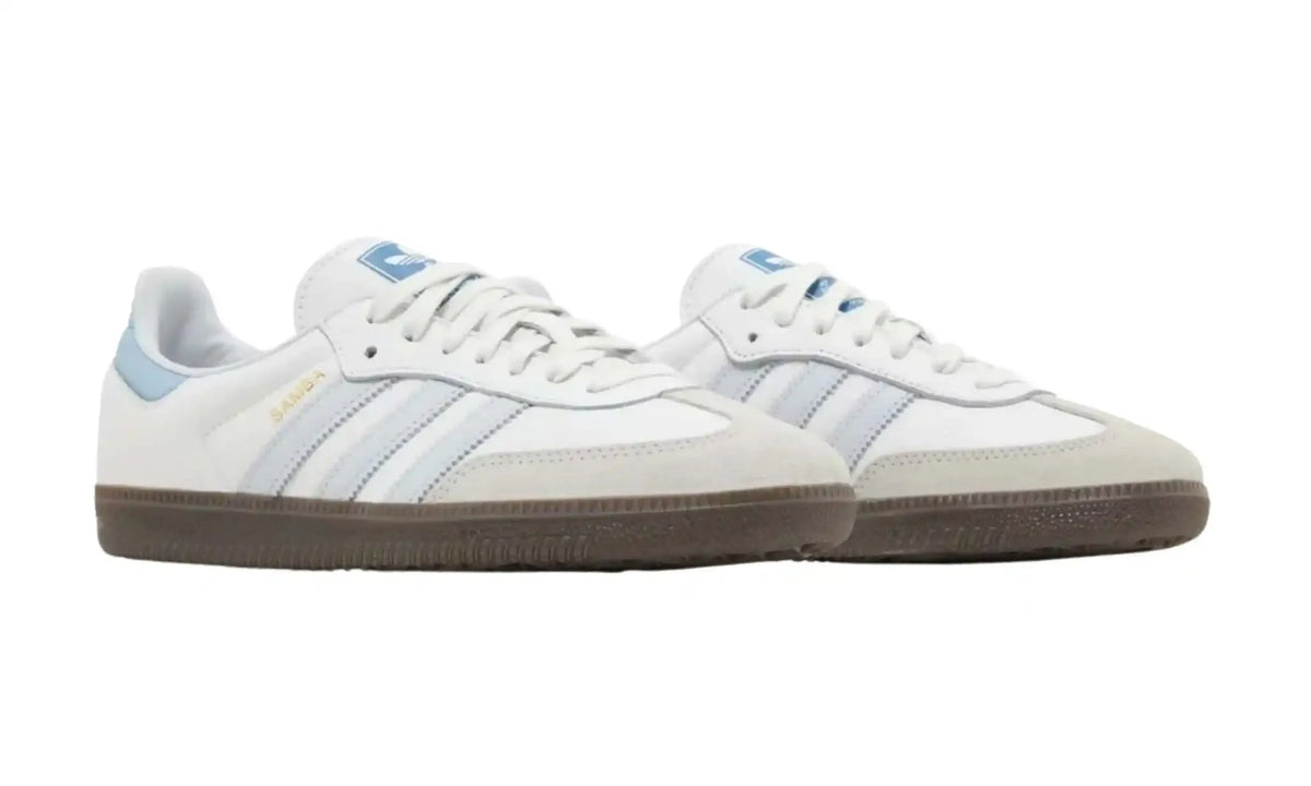 Adidas Samba OG white light blue unisex sneakers with pale blue stripes and dark gum sole, front angled pair view