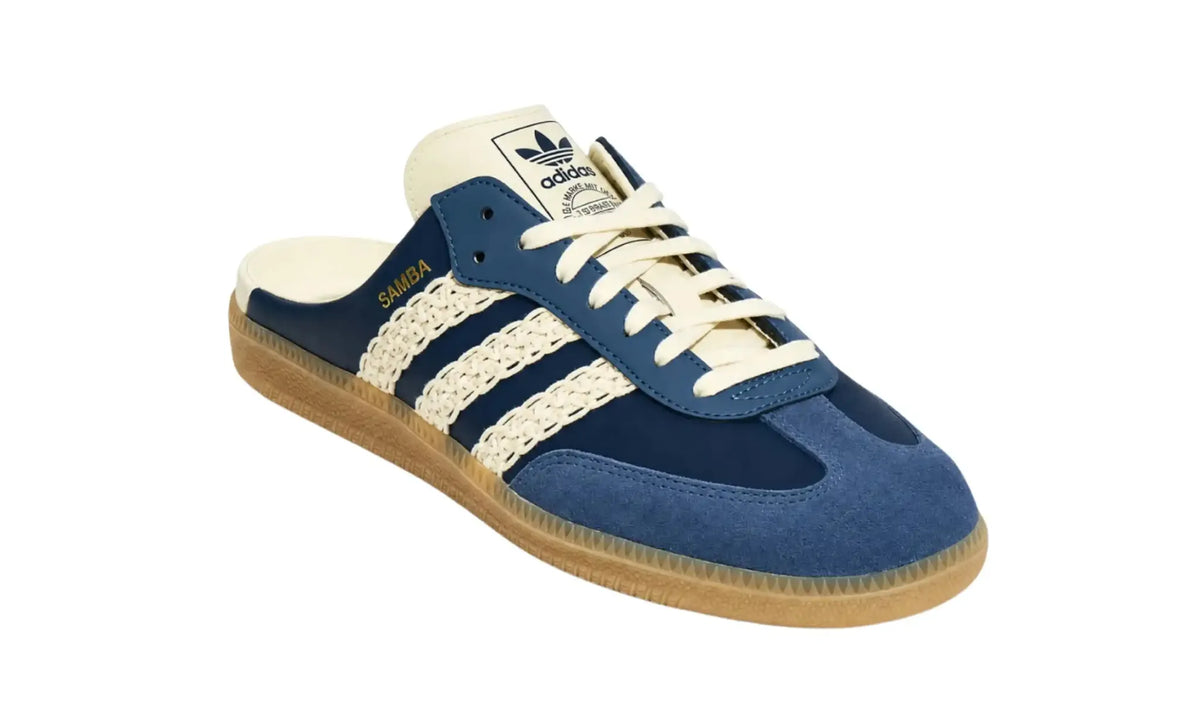 Adidas Samba OG Mule in navy blue with cream woven-style stripes and laces, a blue T-toe overlay, an open heel and a gum-coloured sole