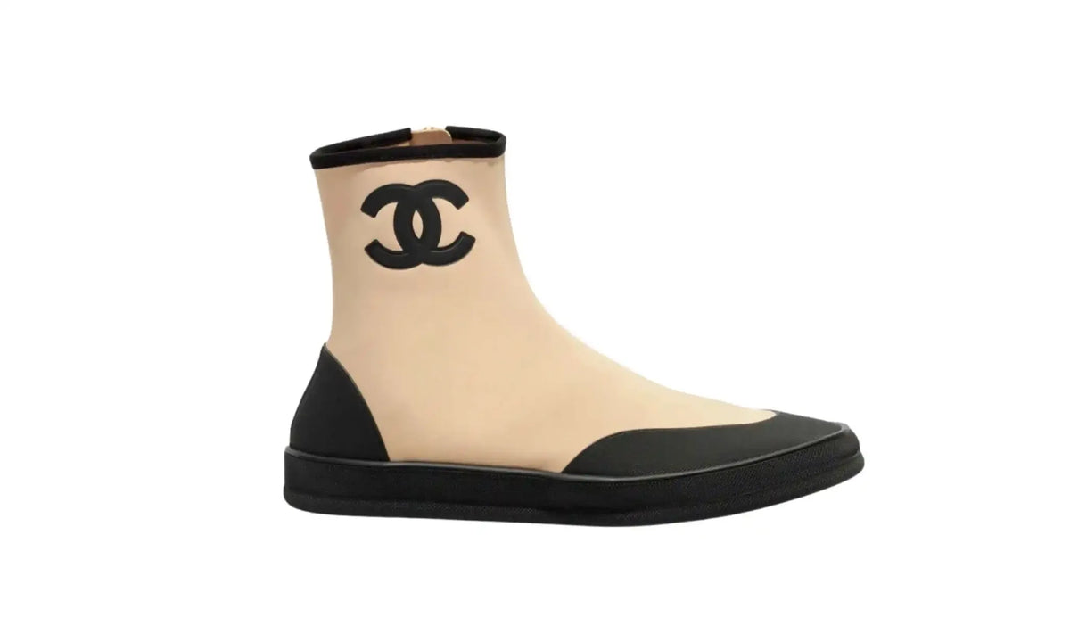 Chanel Beige Black Short Boots for Women side view with black CC logo, black top trim, contrasting toe and heel overlays and black sole