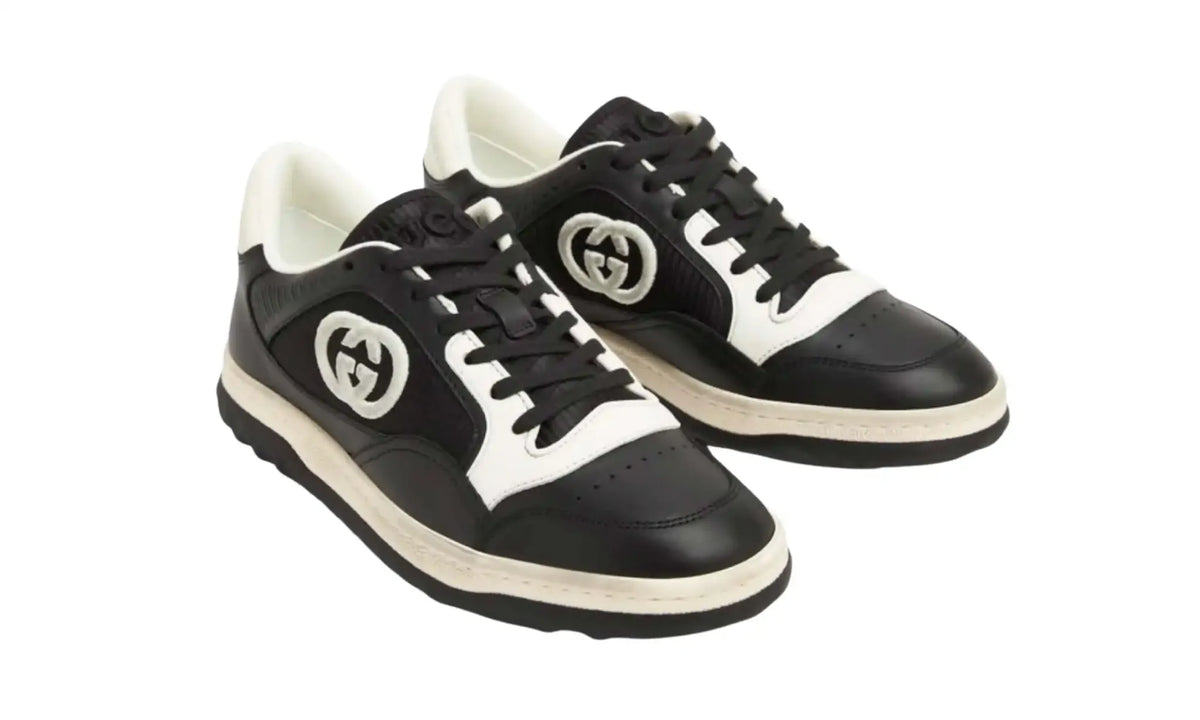 Front angled view of Gucci GG Black/Ivory sneakers with black laces and contrasting GG detail