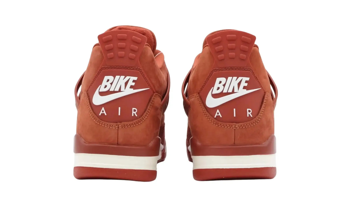Rear view of Nigel Sylvester Air Jordan 4 Brick by Brick sneakers showing Bike Air heel branding