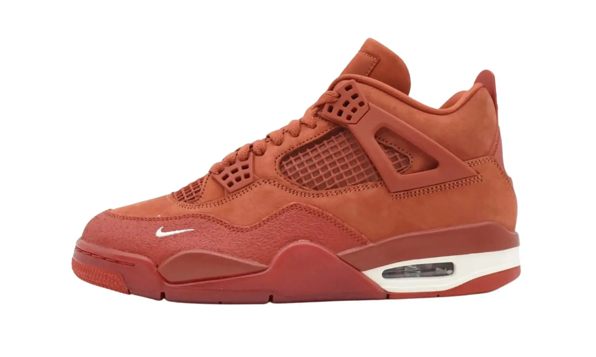 Opposite side view of Nigel Sylvester Air Jordan 4 Brick by Brick sneakers in orange with Sail accents