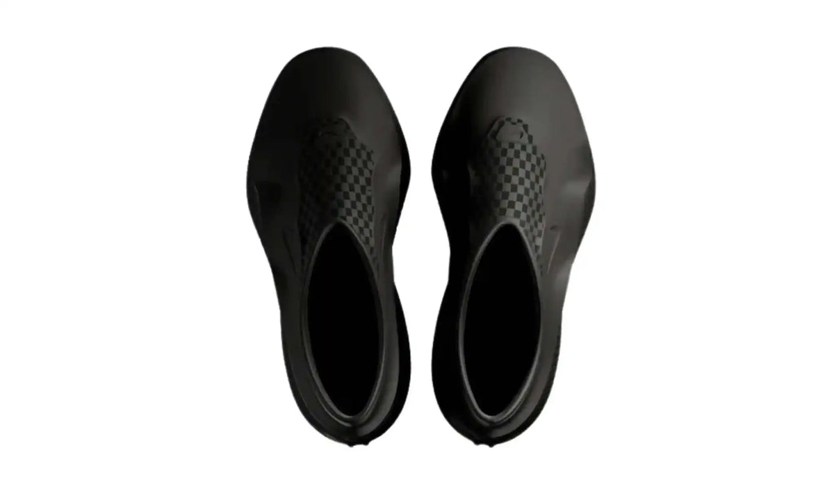 Nike Air Max 1000 Black men’s slip-on sneakers, top view showing lace-free uppers and closed heels