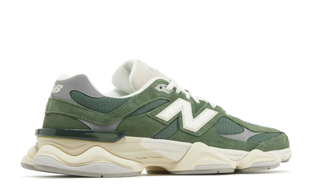 Green and white sneaker with New Balance logo on a white background