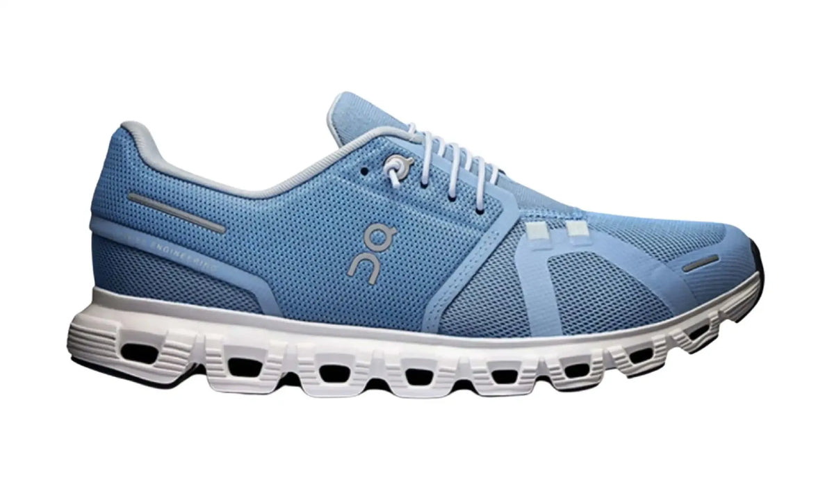 On Cloud 6 unisex sneaker in light blue and white with a mesh-style upper, light-coloured laces, grey logo detailing and pod-shaped sole openings