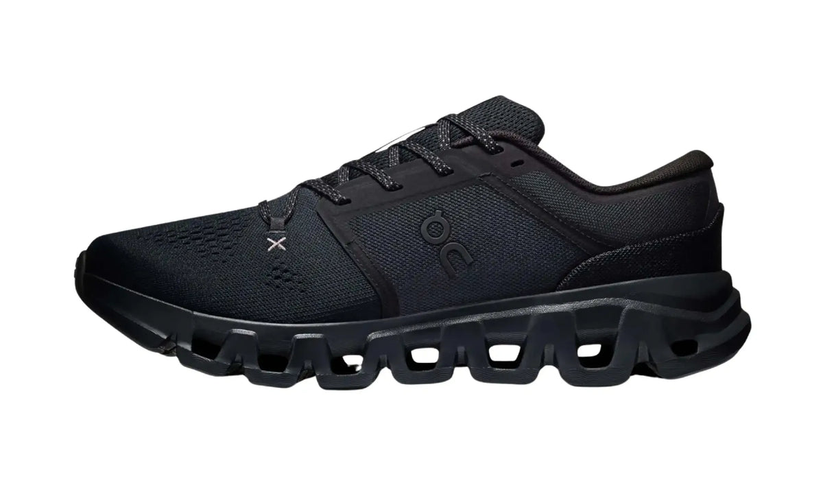 On Cloud X 5 Black unisex shoes, inner side view showing tonal overlays and sculpted dark sole