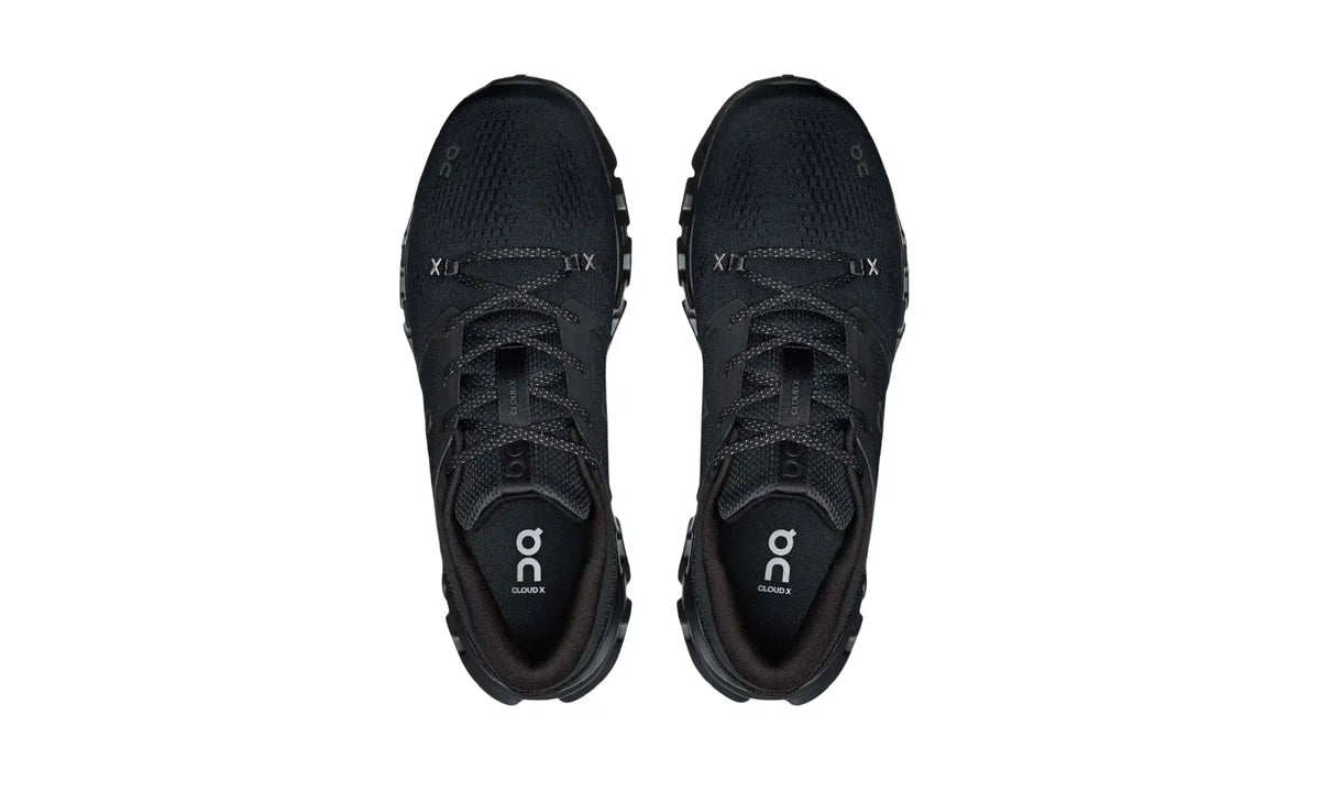 On Cloud X 5 Black unisex shoes, top view showing patterned black laces, grey X details and On footbed logos