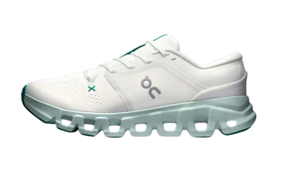 On Cloud X 5 Ivory Surf unisex shoes, inner side view showing mesh-style panels, laces and sculpted pale mint sole