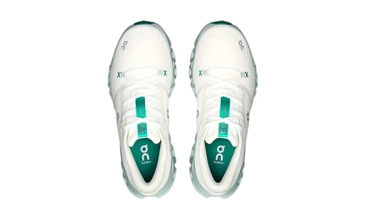 On Cloud X 5 Ivory Surf unisex shoes, top view showing white laces, green tongue details and green footbeds