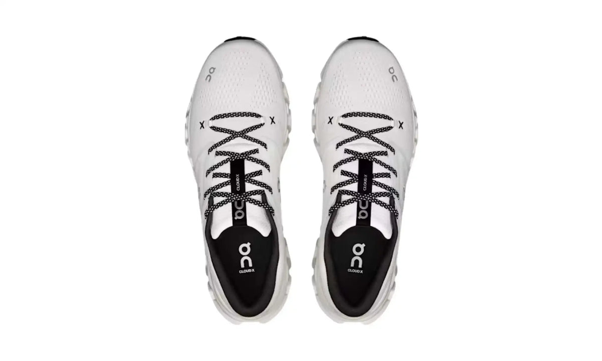 On Cloud X 5 White Black unisex shoes, top view showing black patterned laces, black X details and black footbeds
