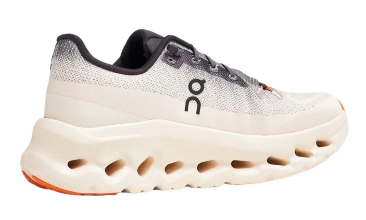 Angled pair view of On Cloudtilt Iron/Dew women's everyday sneakers