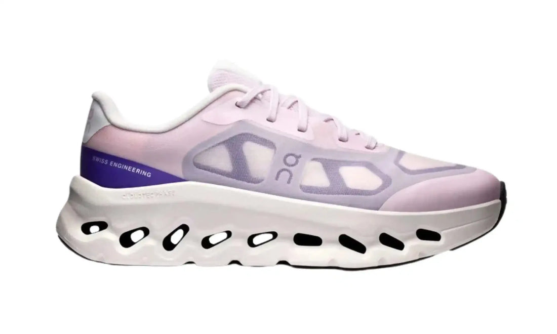 On Cloudtilt Remix women’s sneakers in pink, lilac and ivory, side view with pale pink upper, grey-lilac overlays, purple heel accent and ivory sole openings
