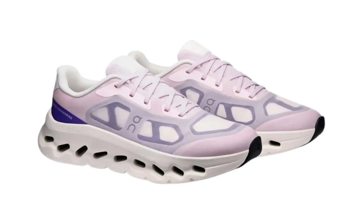 On Cloudtilt Remix women’s sneakers in pink, lilac and ivory, angled pair view showing layered overlays, light-coloured laces and sculpted ivory soles