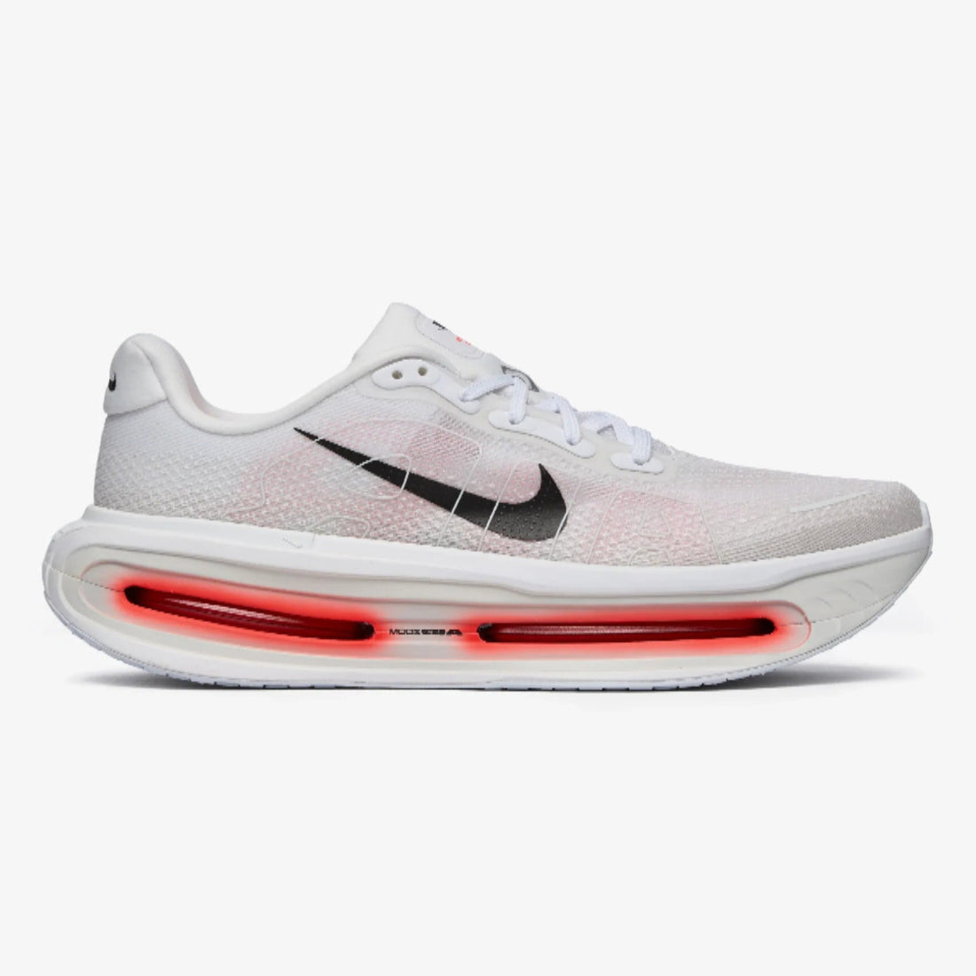 White sneaker with red sole on a white background