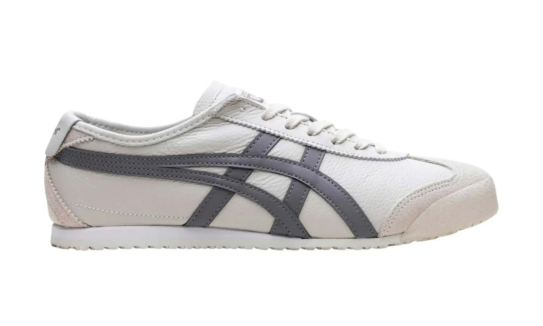 Onitsuka Tiger Mexico 66 unisex sneaker with a white textured base, grey side stripes, light-toned toe and heel overlays and white laces