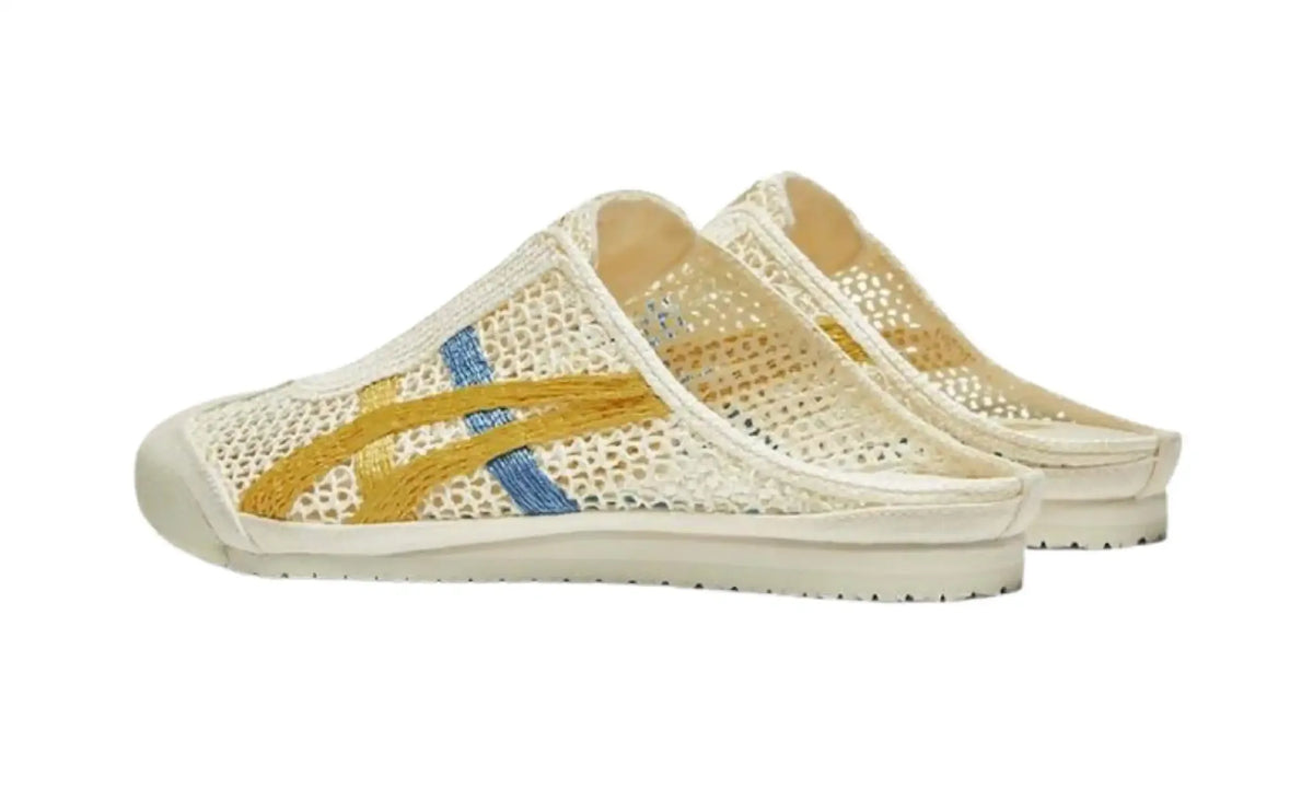 Pair of Onitsuka Tiger Mexico 66 Sabot Cream Mustard unisex mules, rear side view showing open heels