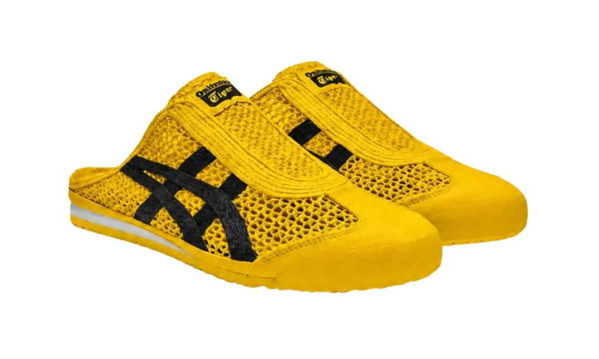 Pair of Onitsuka Tiger Mexico 66 Sabot Yellow Black unisex mules, angled front view