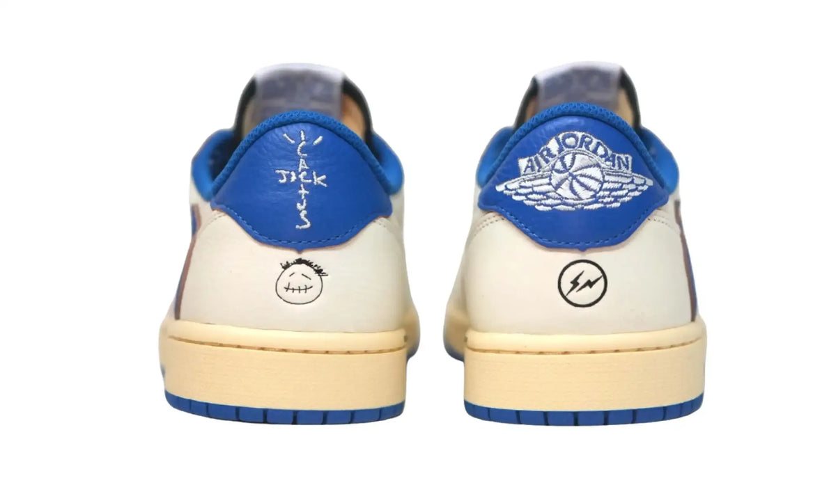 Rear view of Travis Scott Fragment Jordan 1 Low Sail Military Blue sneakers with blue heel panels and embroidered logos