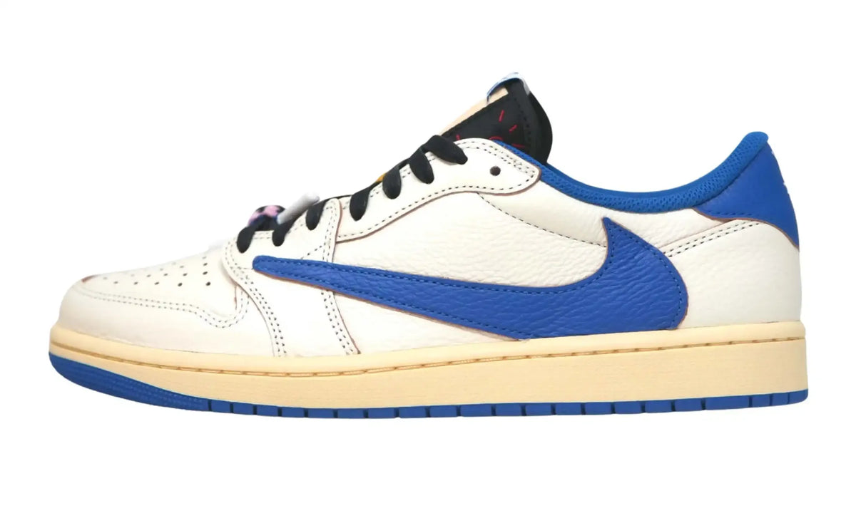 Opposite side view of Travis Scott Fragment Jordan 1 Low Sail Military Blue sneakers with cream midsole